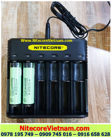 Nitecore Q6 (Bộ sạc 06 Khe Sạc kèm sẳn 042pin SẠC 18650 PANASONIC NCR18650B 3400mAh dòng xả 10A lithium 3.7v) chính hãng